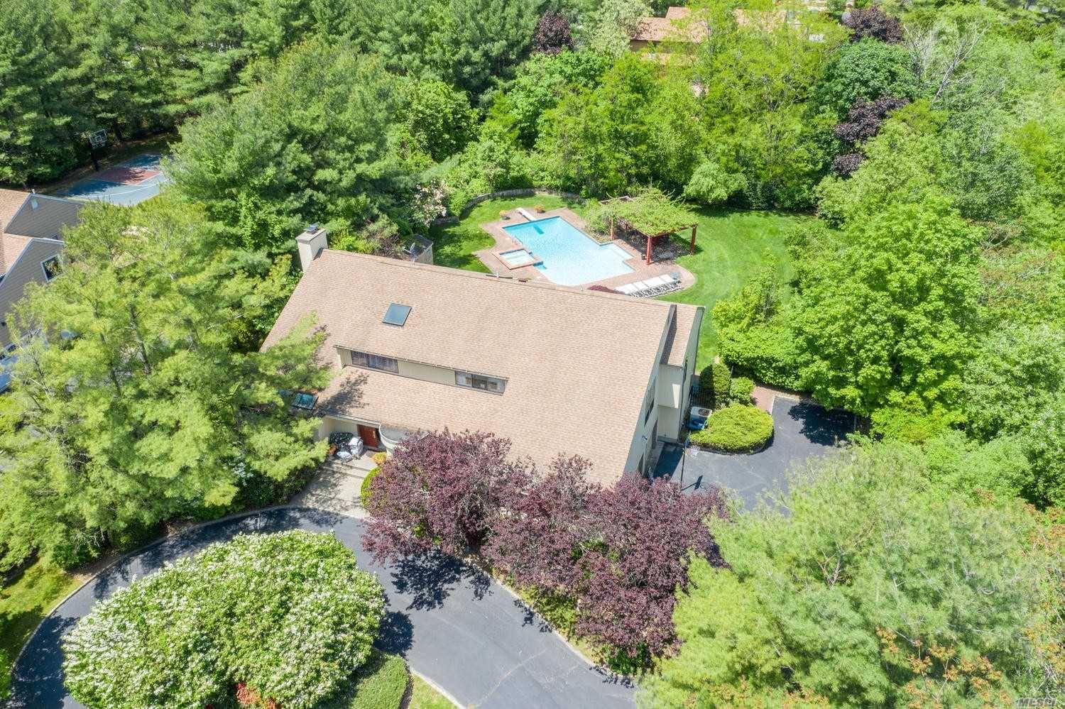 Sprawling Contemp Colonial In Prestigious Gated Community Set On Over Half Acre.