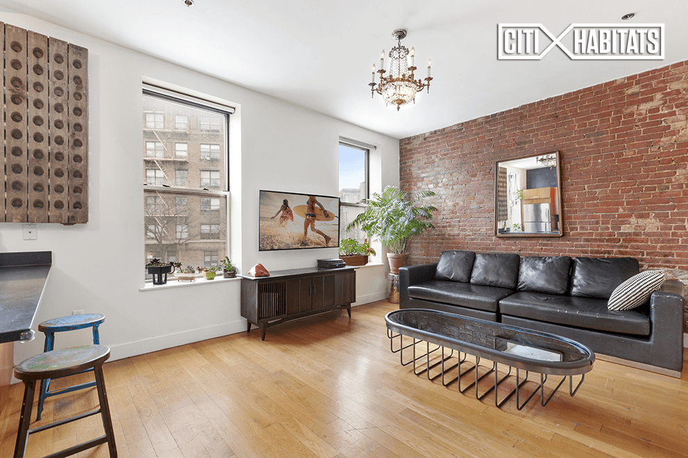 This charming residence combines a pre war and new construction synergy and features 9'6' high ceilings along with unique accents including beautifully exposed brick, hardwood flooring, and 7ft oversized windows ...