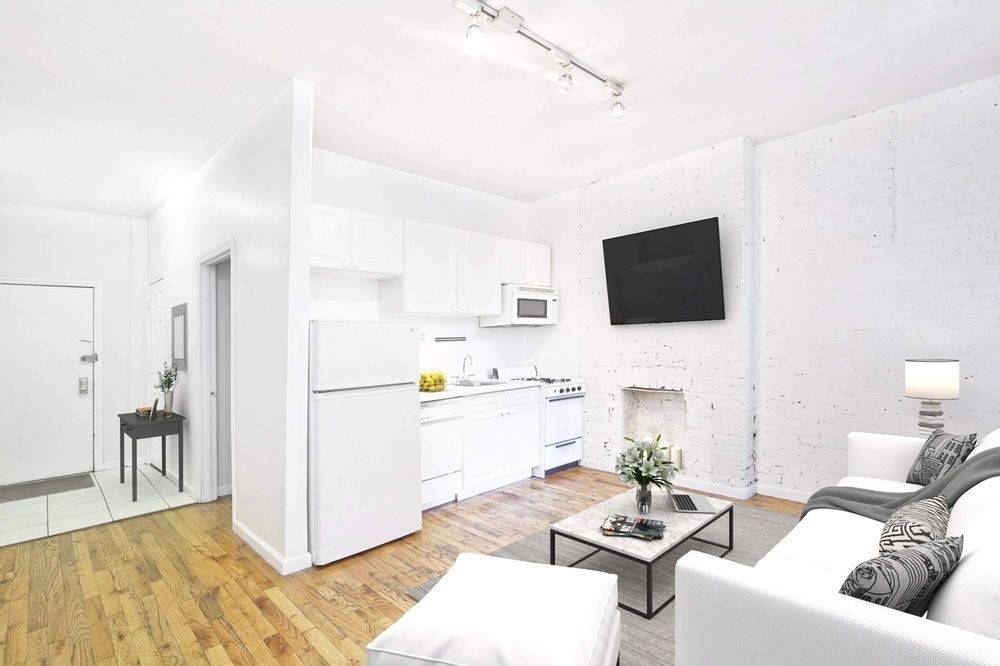 Live in the Heart of it All!  Bright & Sunny 2 Bedroom with 1.5 Bathrooms