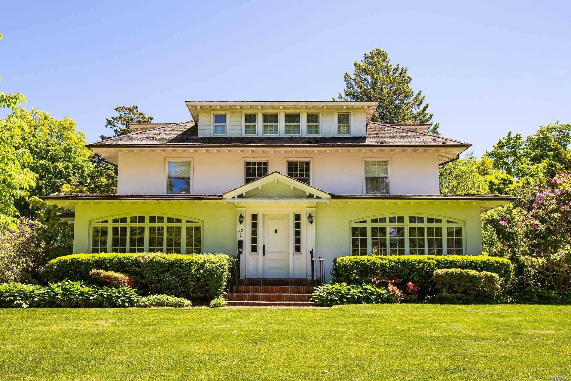Grand and gracious, this turn of the Century home boasts exquisite original detail.