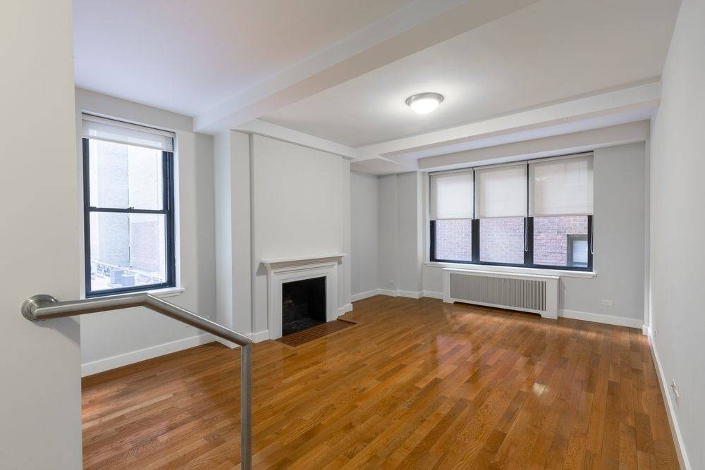 Beautiful No Fee 1 Bedroom in Midtown East featuring a Huge Sunken Living Room and Amazing Closet Space