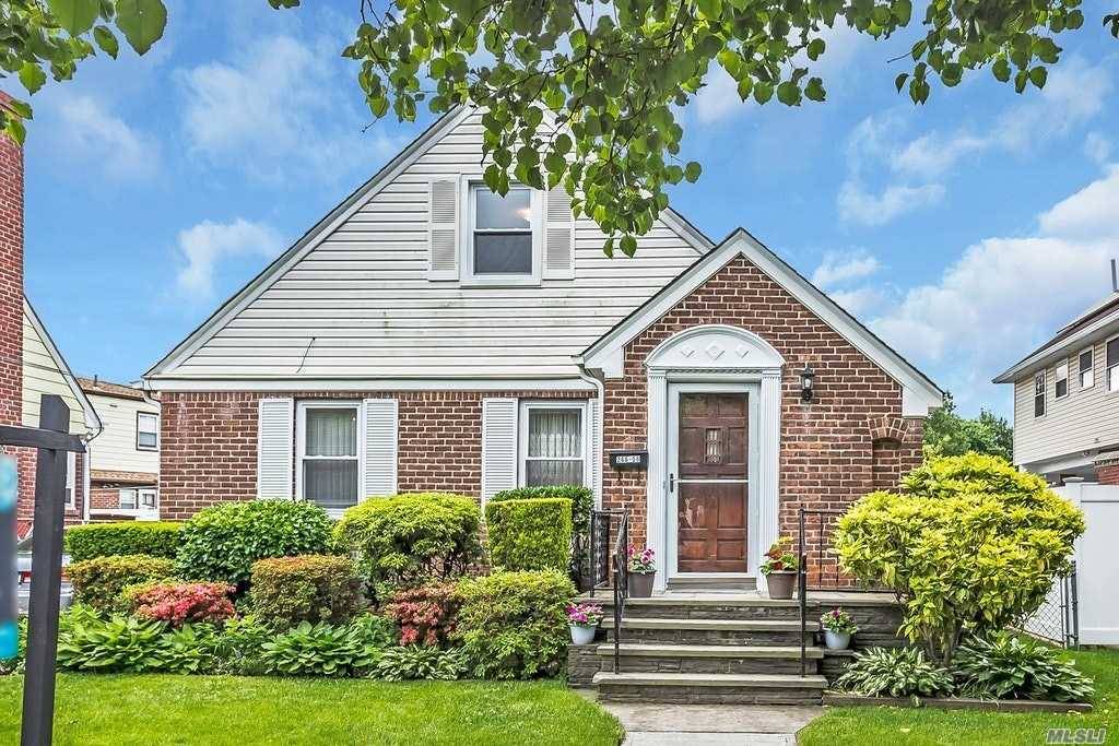 Handsome Cape Cod Style Residence located in the heart of Floral Park.