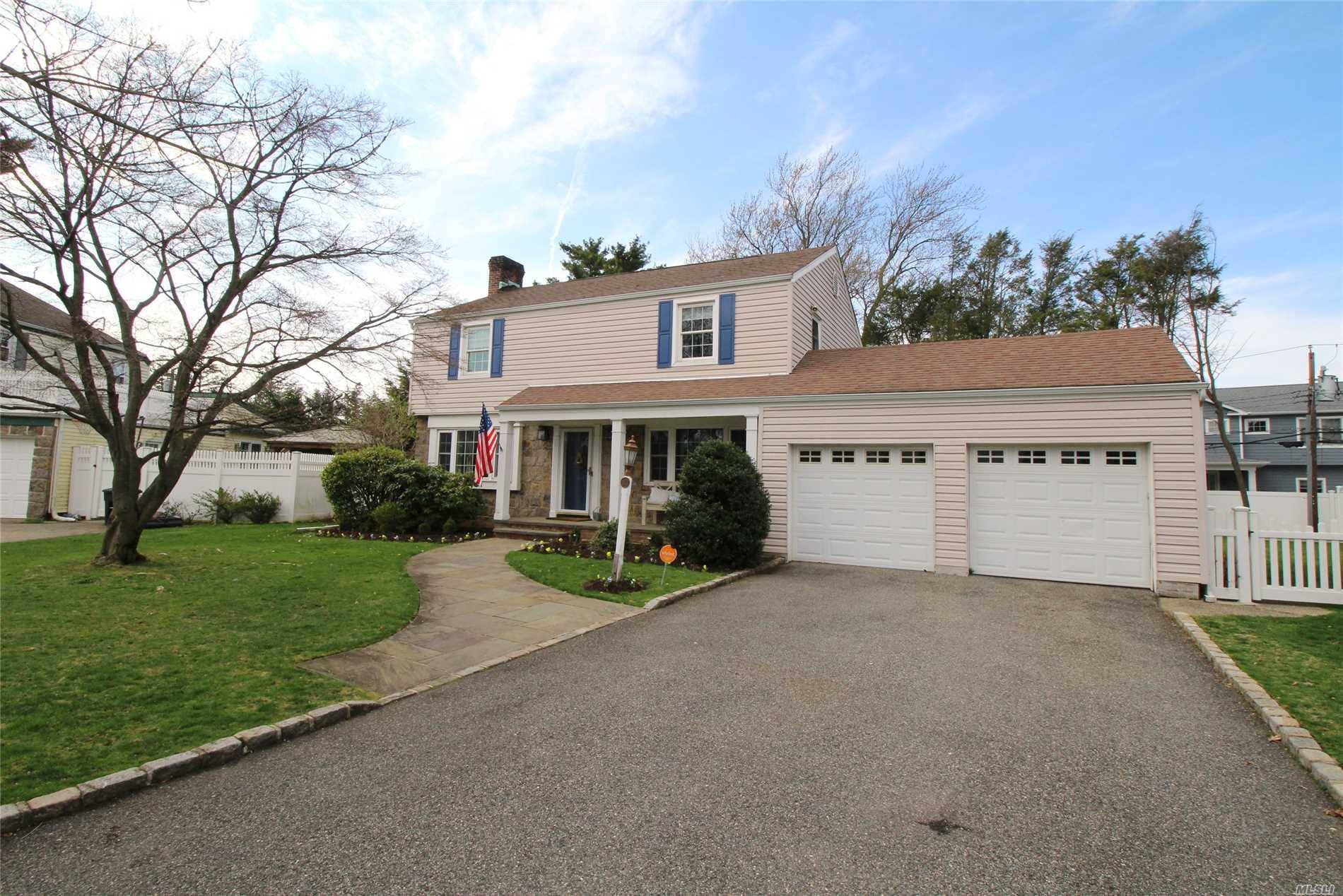 Super Clean and Beautiful Center Hall Colonial, Located On a Tree lined Block In The Birchwood Section.