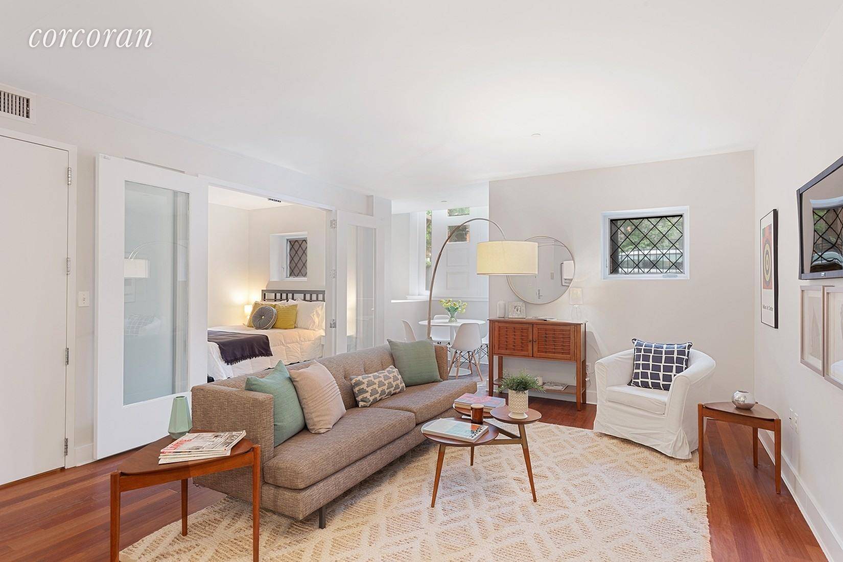 In the heart of tree lined Fort Greene, in a converted church and rectory one block from Fort Greene Park, this lovely condo offers over 1500 square feet of space ...