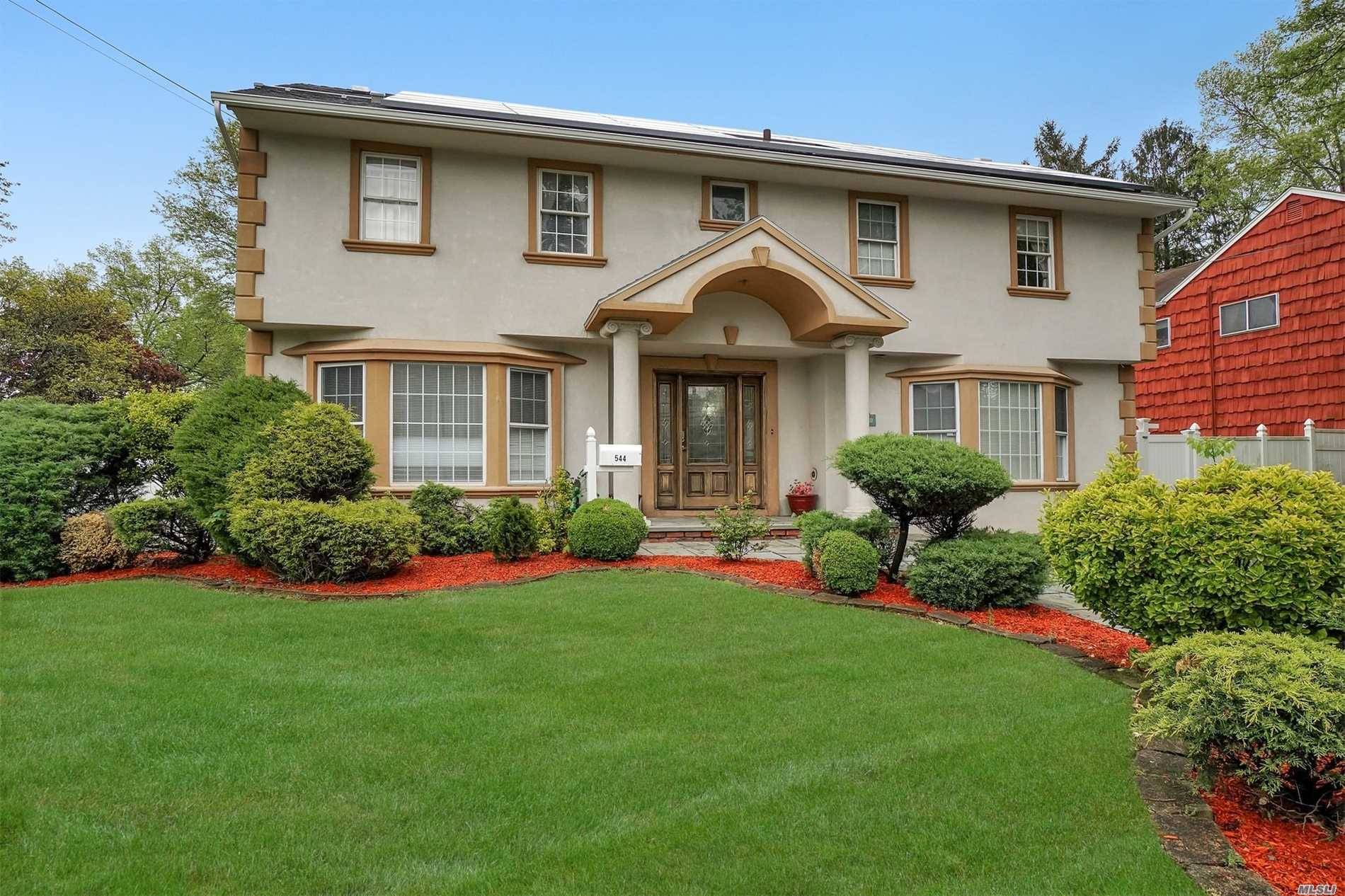 Updated Spacious Colonial Home in North Westbury.