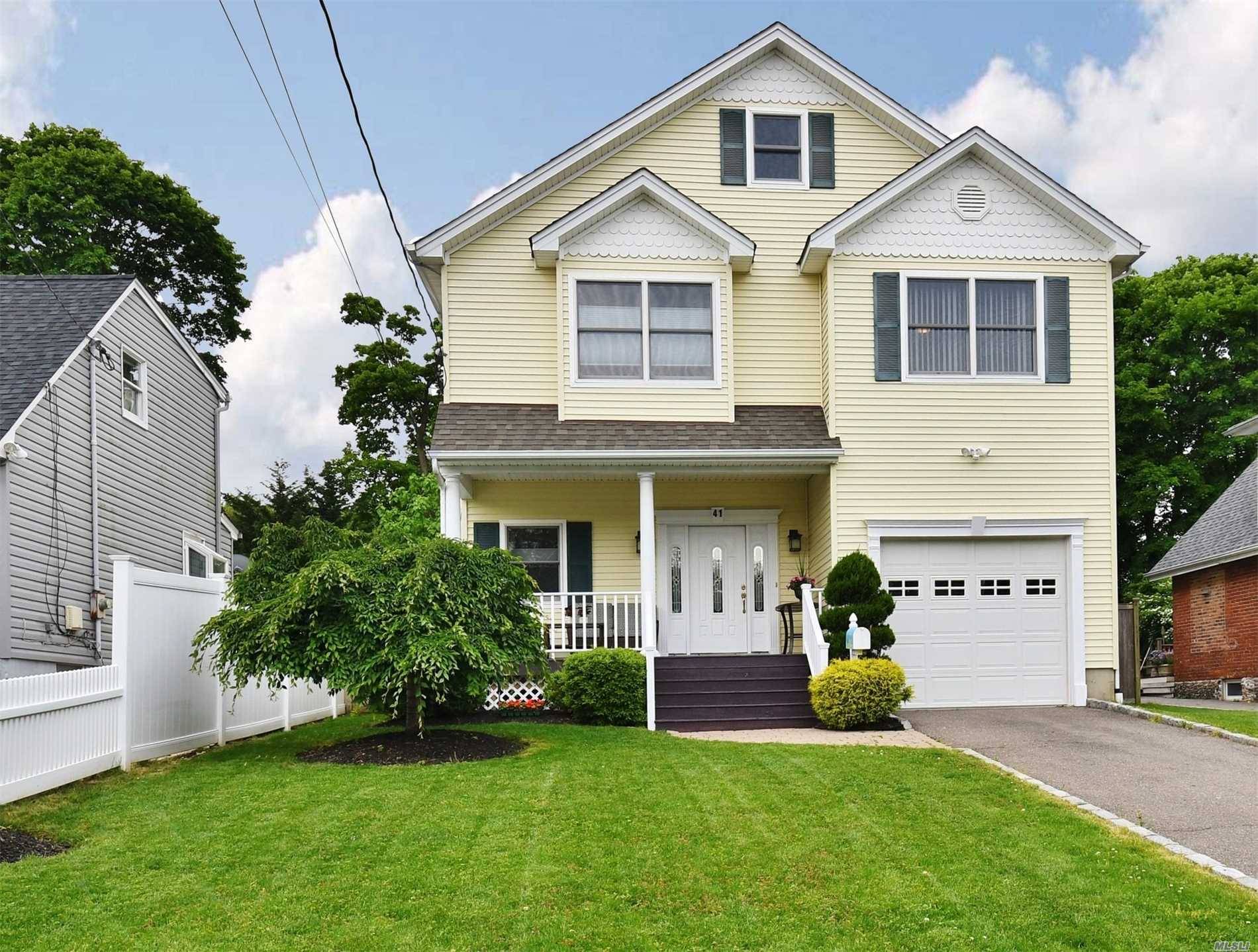 Young 4 BR, 2. 5 Bth Colonial on a private mid block location.