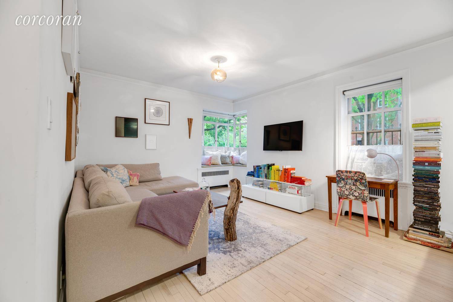 Sun drenched and serene, this thoughtfully renovated, impeccably appointed, elevated above street level, alcove studio offers gorgeous finishes and a coveted West Village location.
