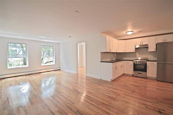 Sprawling two bedroom in an over sized half floor townhouse facing south onto interior gardens.