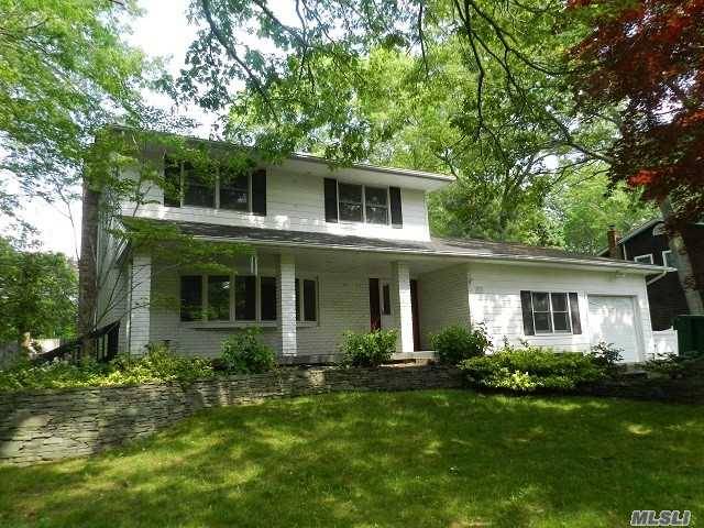 Spacious Colonial in As Is condition Freshly Painted Needs Updating Wood Flooring Cul de sac.