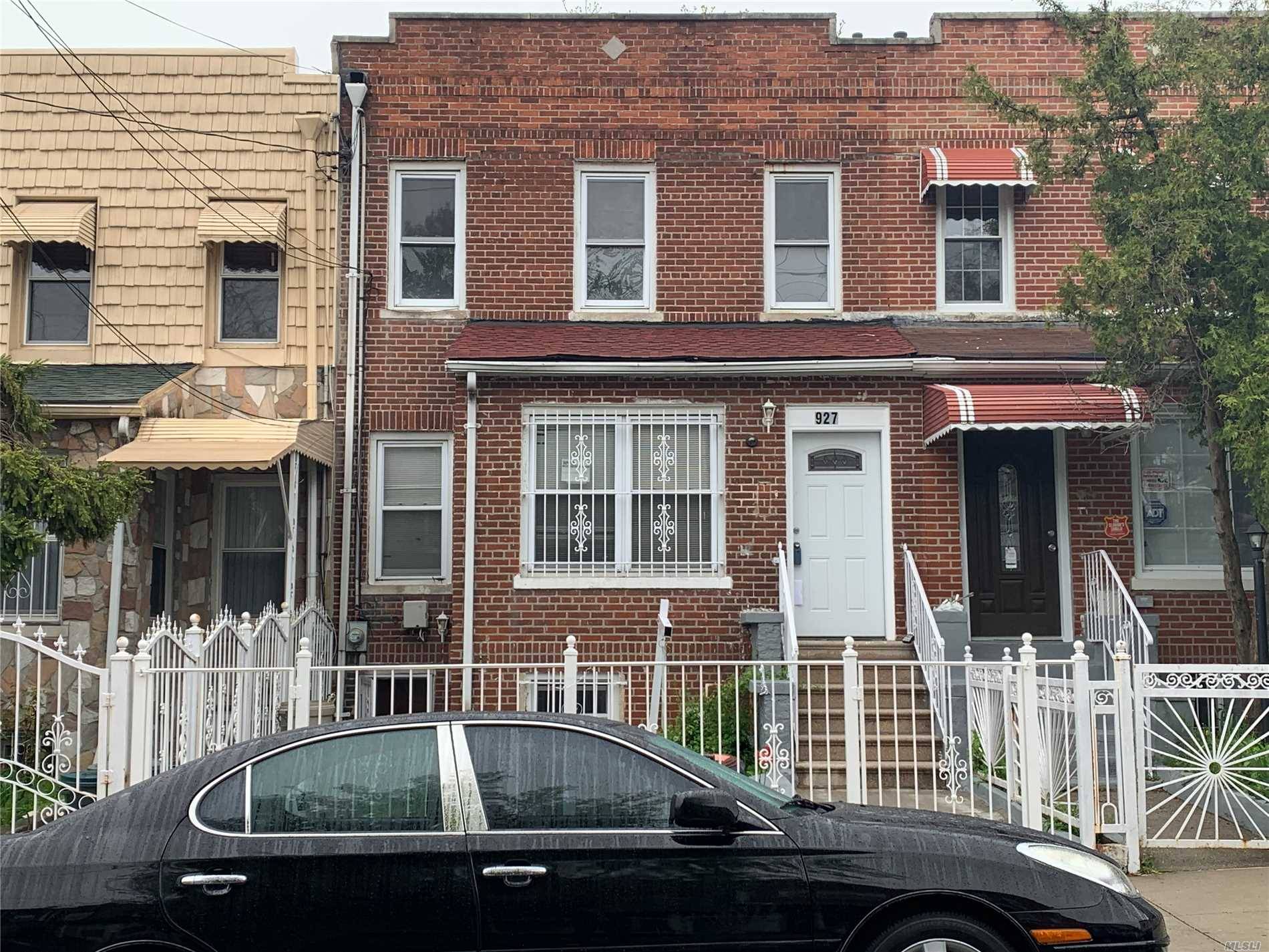 REDUCED. BEAUTIFUL RENOVATED SINGLE FAMILY ATTACHED BRICK WITH ONE BEDROOM ON 1ST FLOOR AND FOUR BEDROOMS ON 2ND.