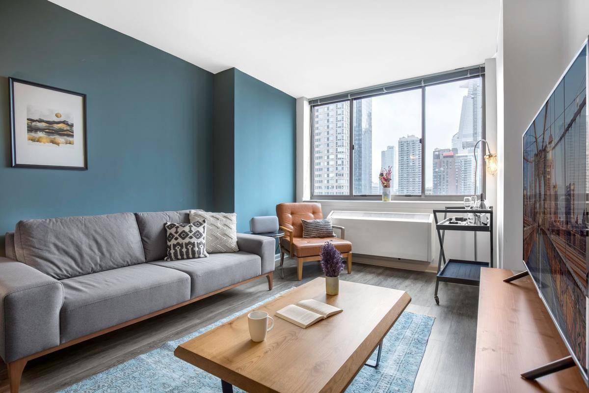 No Fee Newly Renovated Luxury 1 Bed in Midtown West. Amazing Views + W/D!