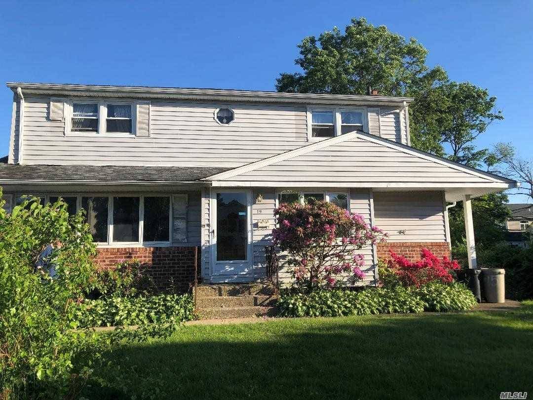 4 Bedroom Colonial in the heart of Syosset Groves with Gas Cooking and Heating !