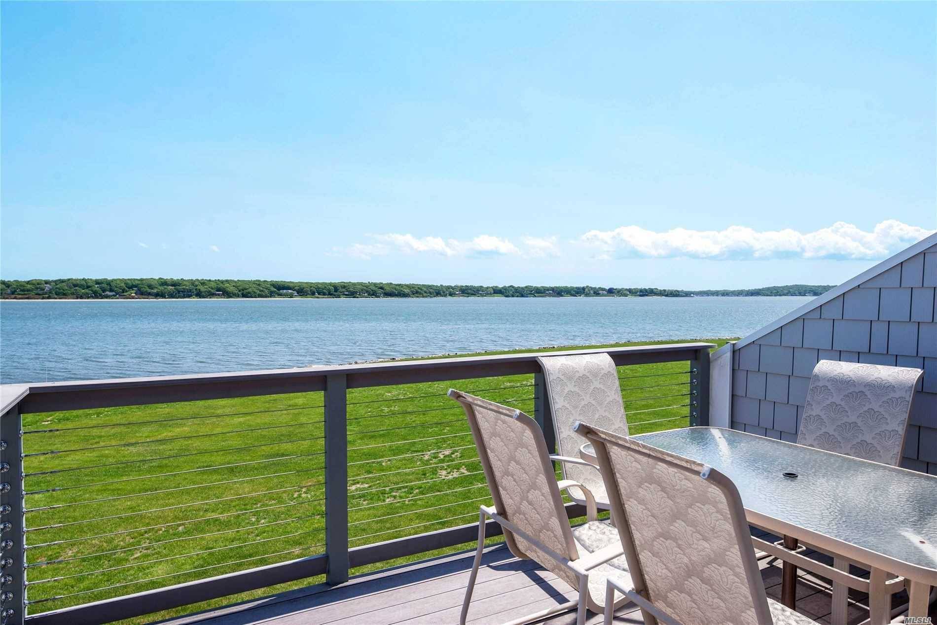 Direct Bay Front Condo with forever views East, South West over Peconic Bay, the South Fork and Shelter Island.