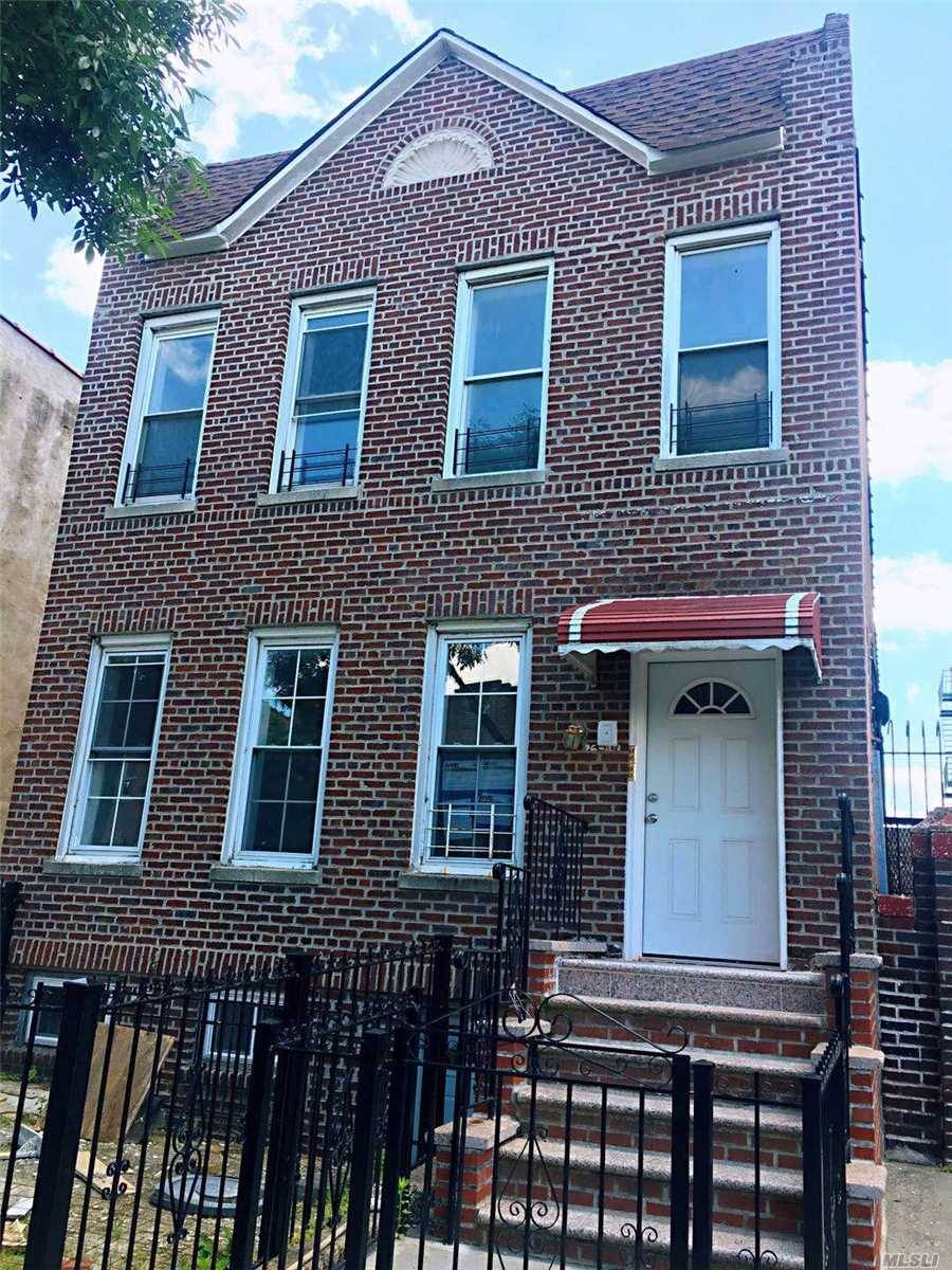 Completely Renovated Mint Condition 4 Family House With 3 Car Garage, 2 Parking Spot, Separate Gas Meters Hot Water Heaters.