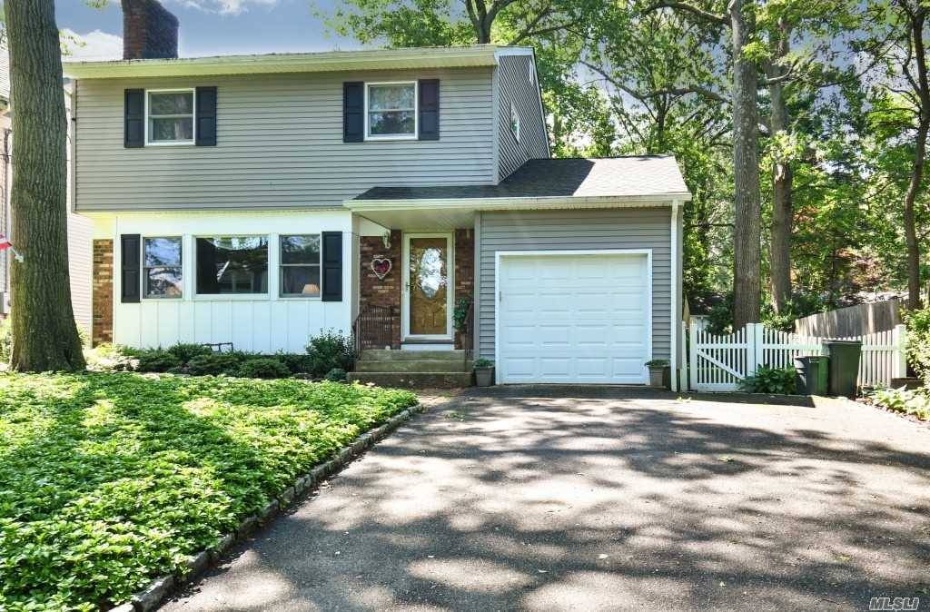 Welcome home to this updated 3 bedroom, 1 1 2 bath colonial in Harborfields acclaimed SD !