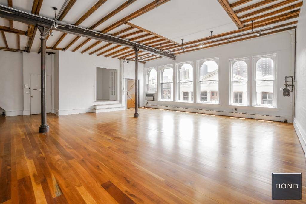 This 3000 square foot Soho classic loft conjures images of great artists at work and downtown culture at its finest !
