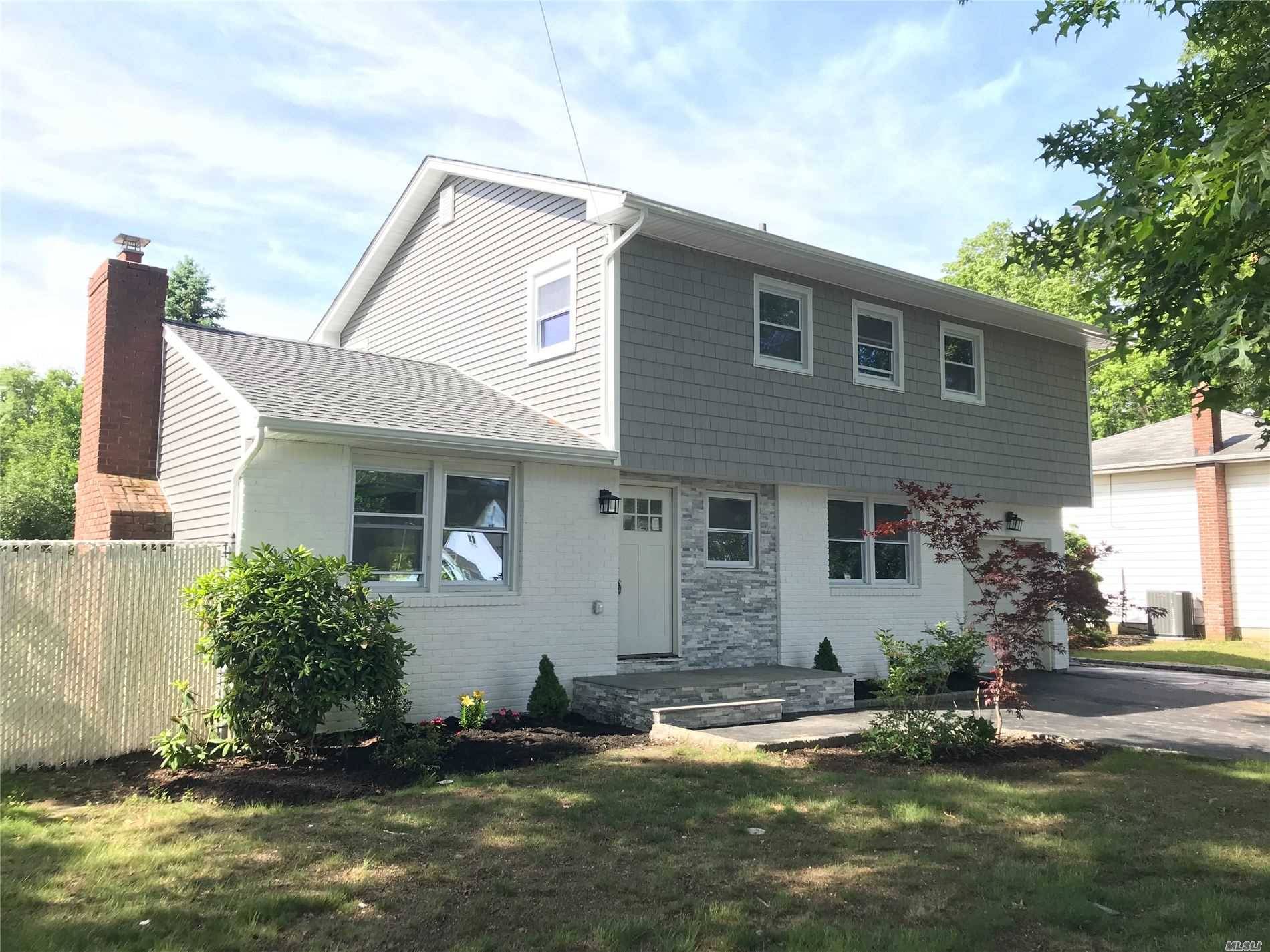 Fully renovated mint condition modern colonial with excellent Commack schools.