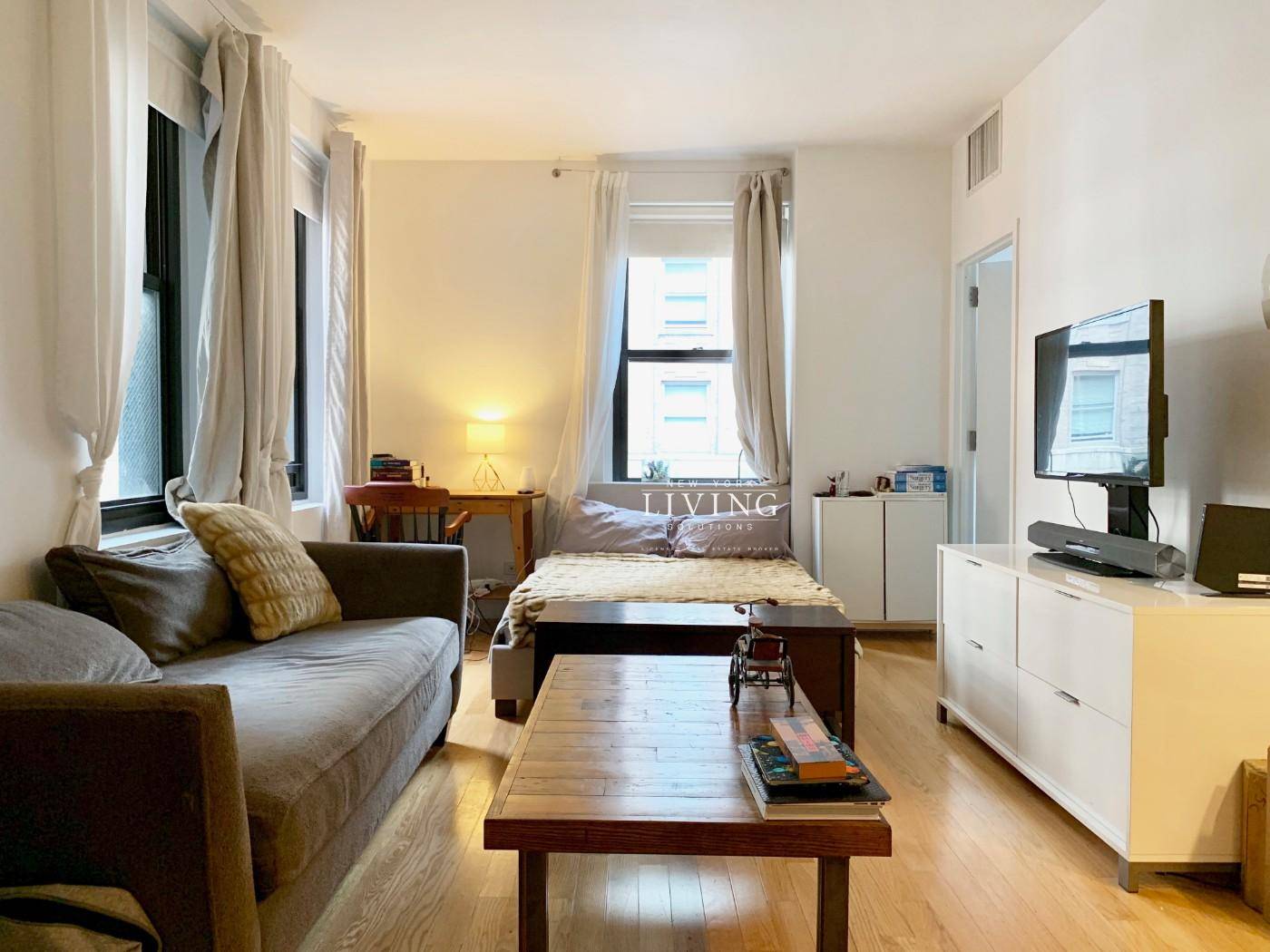 This is an amazing bright studio apartment on a higher floor in a historic landmark building.