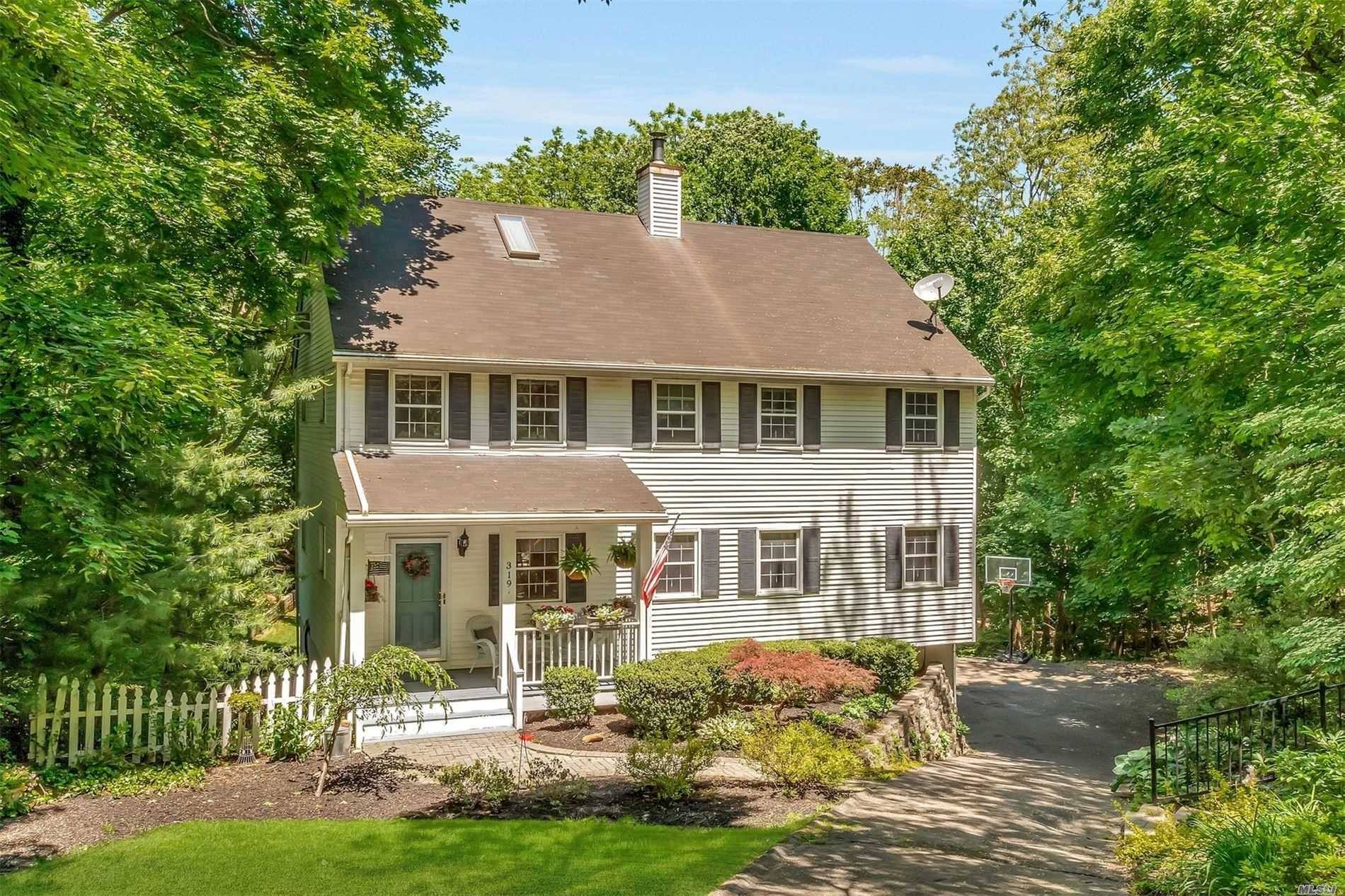 Younger colonial offers versatile floor plan, hardwood floors throughout and 4 levels of living space.