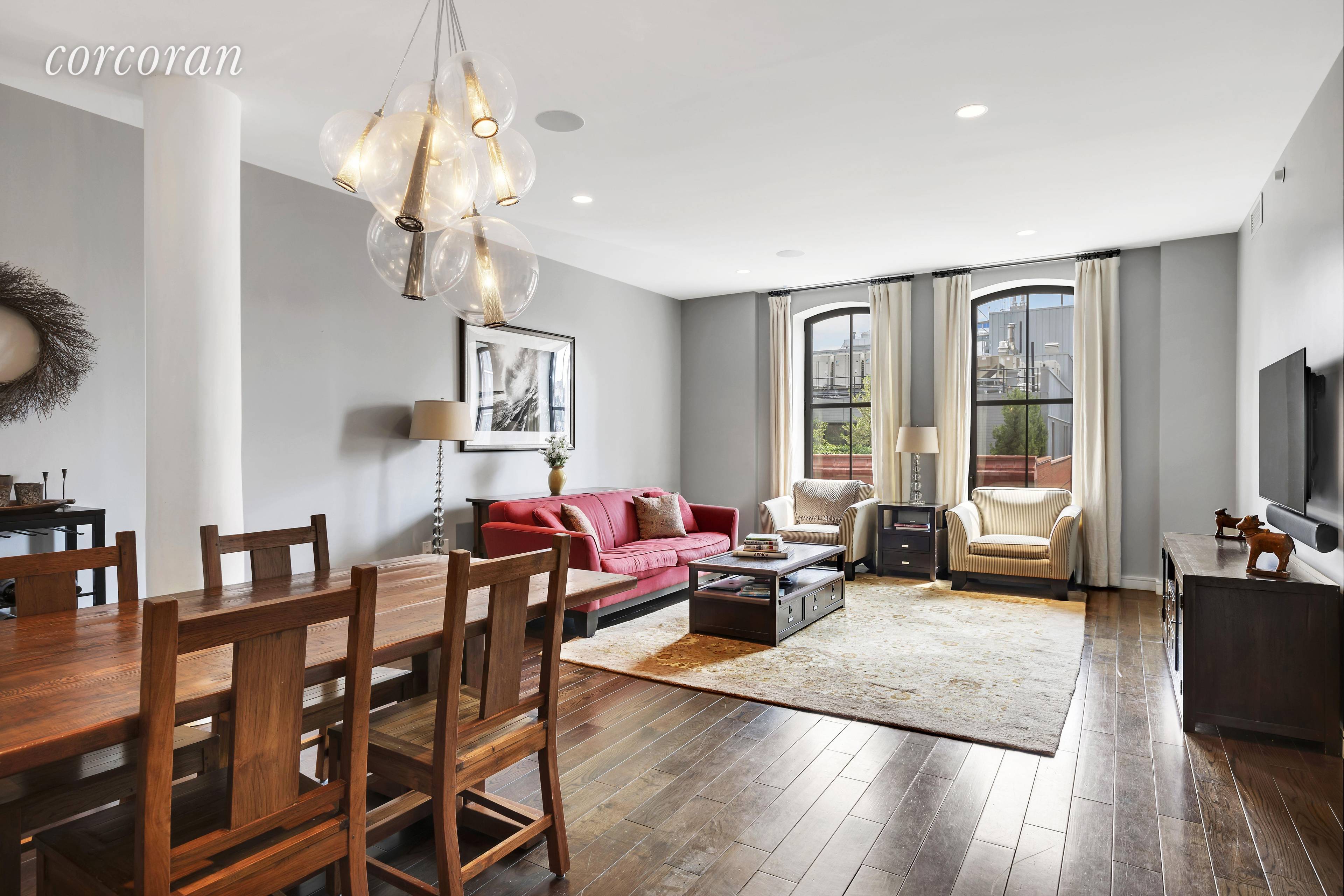 Overlooking the historic buildings on Washington Street, this massive luxury apartment with 2 bedrooms, 2.