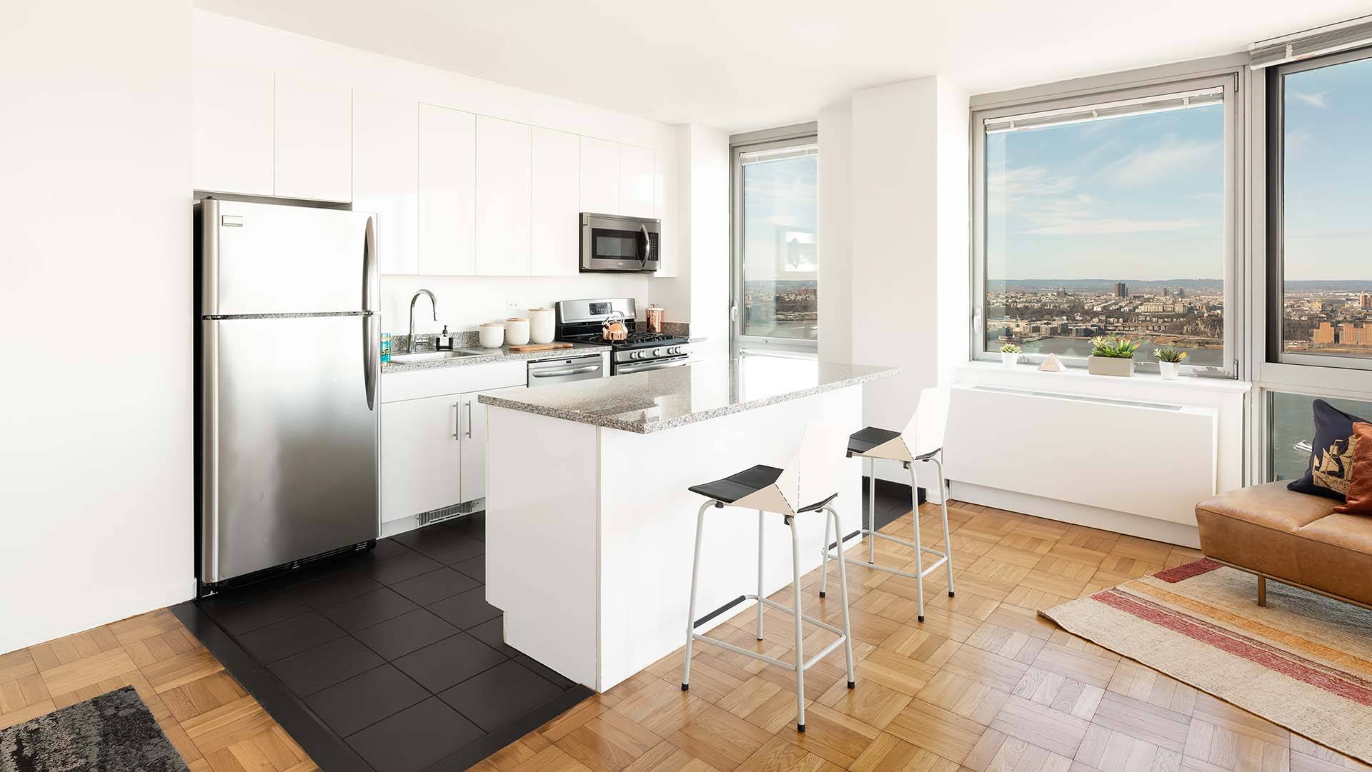 Studio with a Spacious Living Area, Great Closet Space, a Separate Kitchen, Floor-to-Ceiling Windows and a Western Exposure Providing a Views of the Hudson River by Hudson Yards