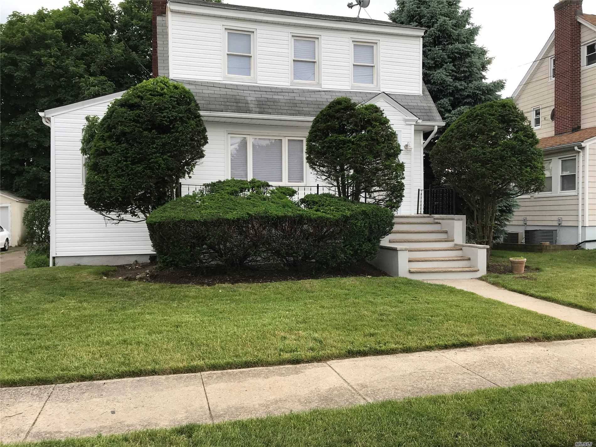 SD 14, nicely renovated 4 br colonial, great location walk to LIRR, shopping, schools and house of worship.