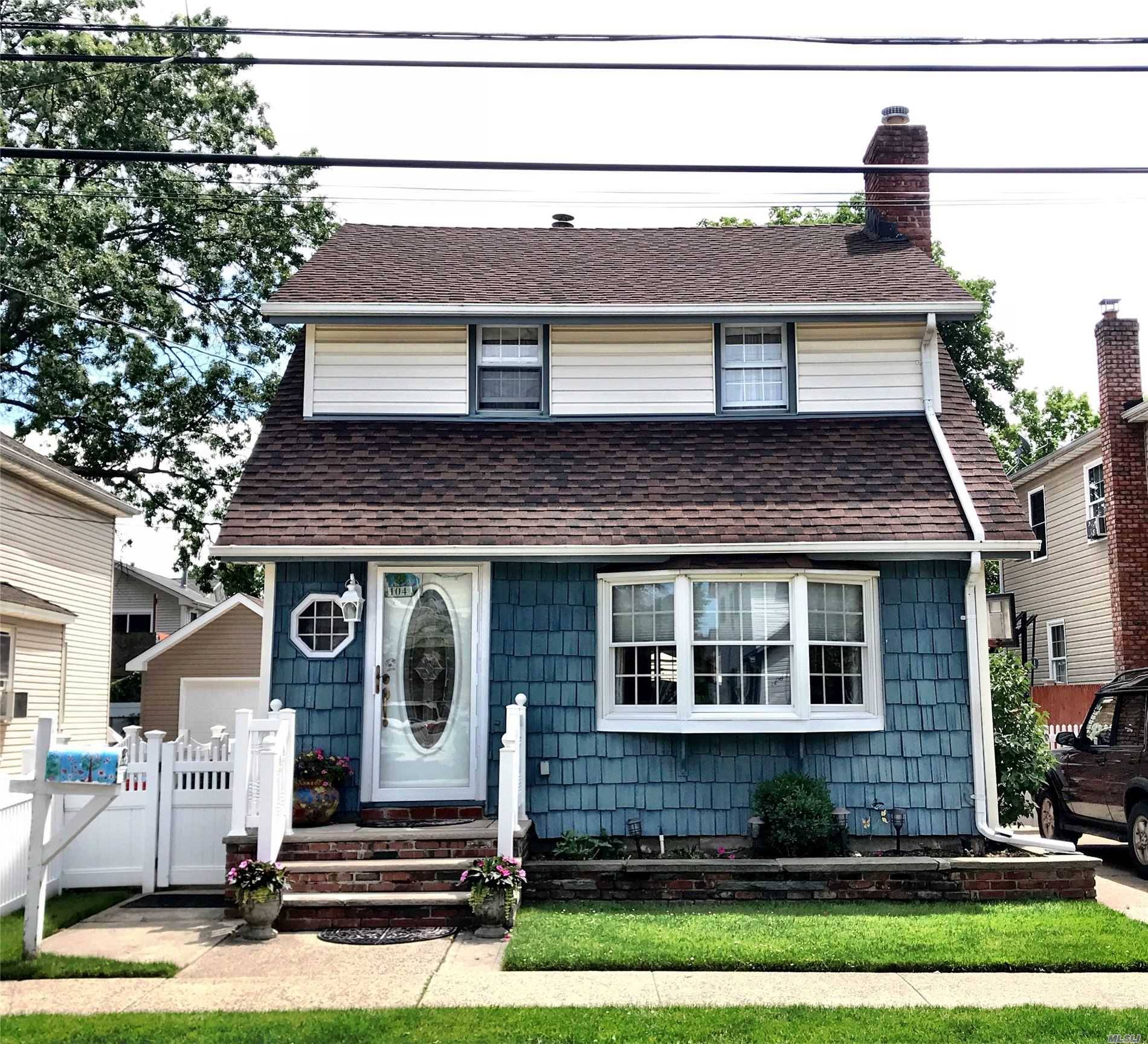 Lovely Dutch Colonial, Located North of Hempstead Tpke in desired Franklin Square.