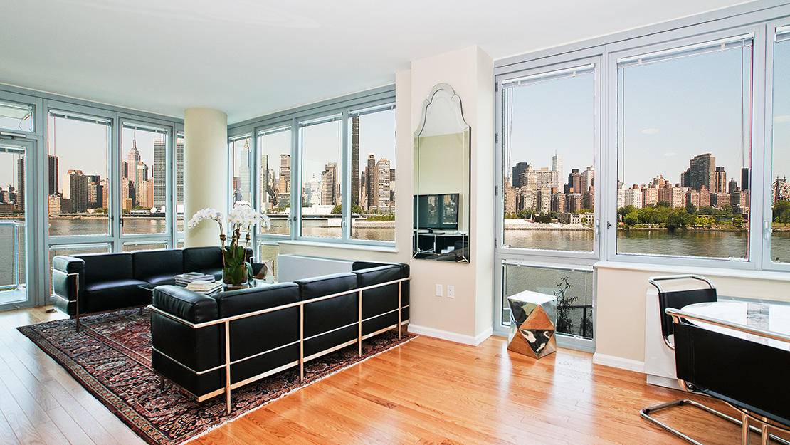 No Fee Long Island City High-floor One Bedroom Apartment with an Open Kitchen, Large Living/Dining Area, Foyer, and Enchanting Southwest Views of Lower Manhattan