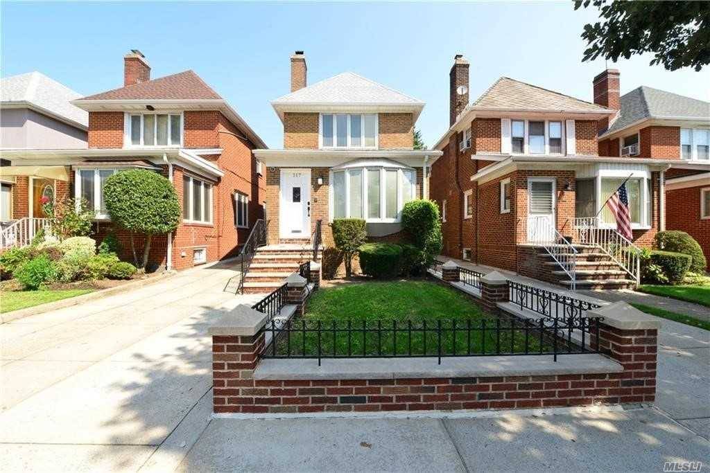 DAZZLING STUNNINGLY RENOVATED BAY RIDGE MASTERPIECE ; LARGE FULLY DETACHED BEAUTIFUL BRICK SINGLE FAMILY DUPLEX COLONIAL HOME WITH EXTRA LONG PRIVATE DRIVEWAY GARAGE 6 CAR PARKING ON AN OVERSIZED 26x120 ...
