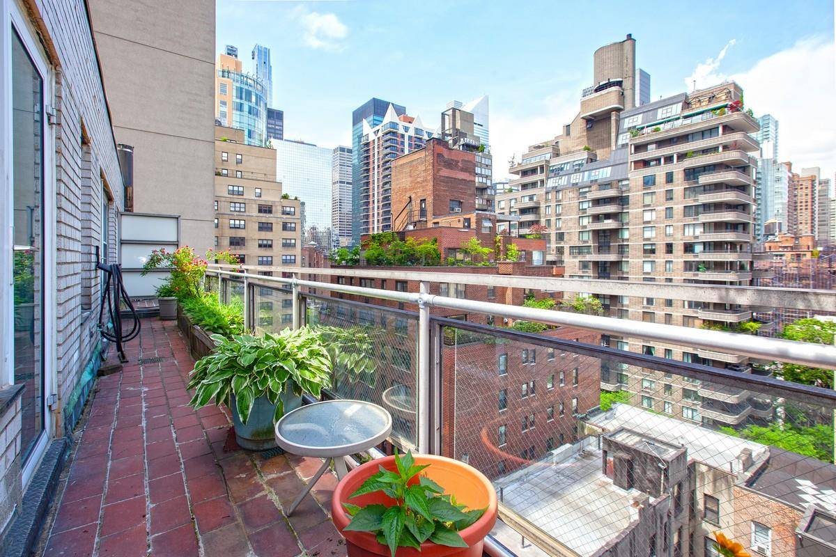 Enjoy bright, open views from your penthouse terrace !