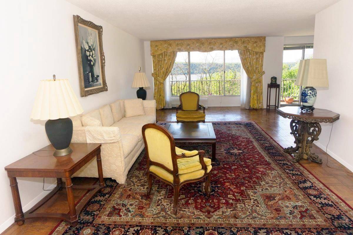 Spacious, sunny 2 bedroom, bath condo with all windows overlooking the Palisades.