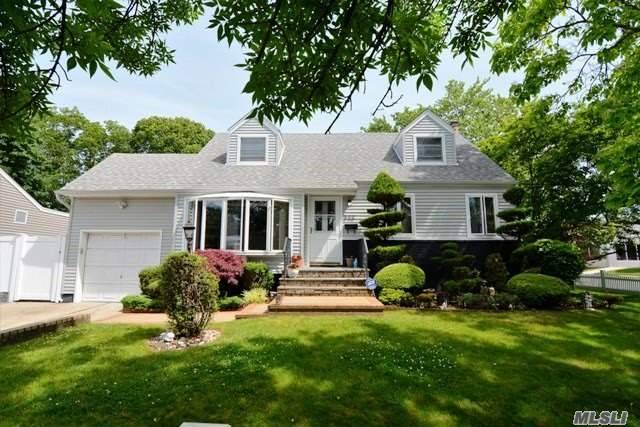 Welcome home to this Expanded Cape Cod style home, a large Kitchen anchors this 4 Bedroom, 2 Bath home located just close enough to the LIRR local parks ball fields, ...