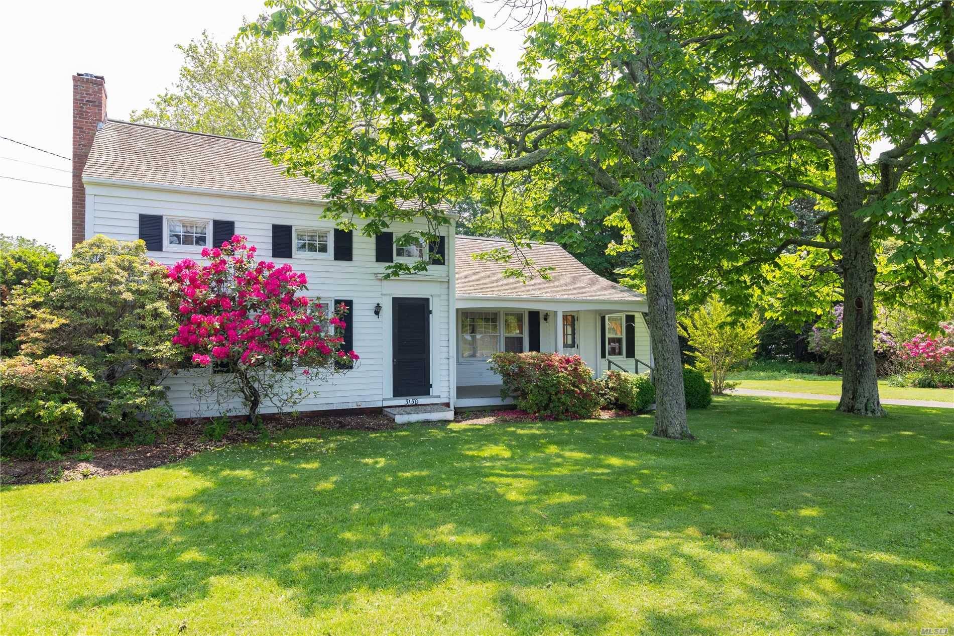 Old North Fork Charmer on 1 acre of manicured property comprised of 3 structures.