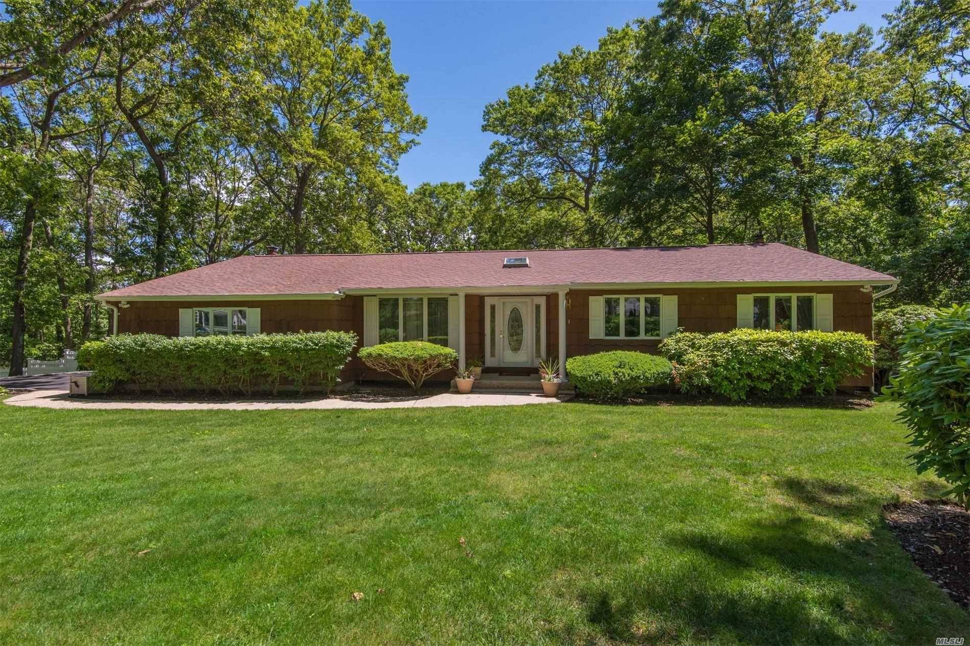 Unmatched Custom Open Floor Plan Ranch on the most sought out 1 Acre secluded Circle in Commack.