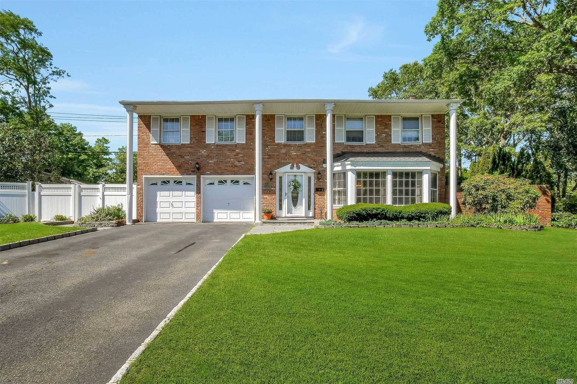Magnificent Brookfield Colonial in Win Oaks blacktop driveway w Cobblestone borders Full front brick exterior white columns 7 year young roof Open flr plan custom wd molding recessed lighting updated ...