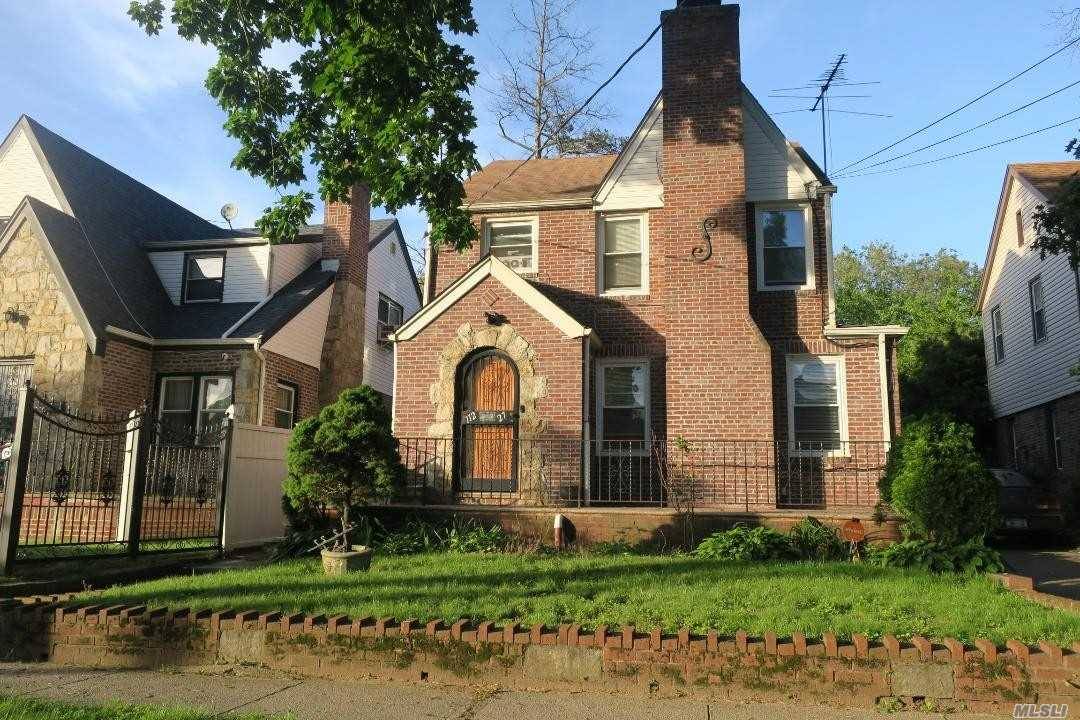Beautiful brick home on a tree lined street located in Historic Addisleigh Park.