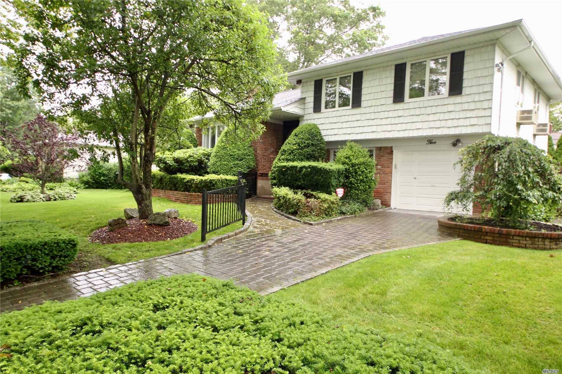 Located On Tree Lined Street, In The Sought After Melville Triangle Area.