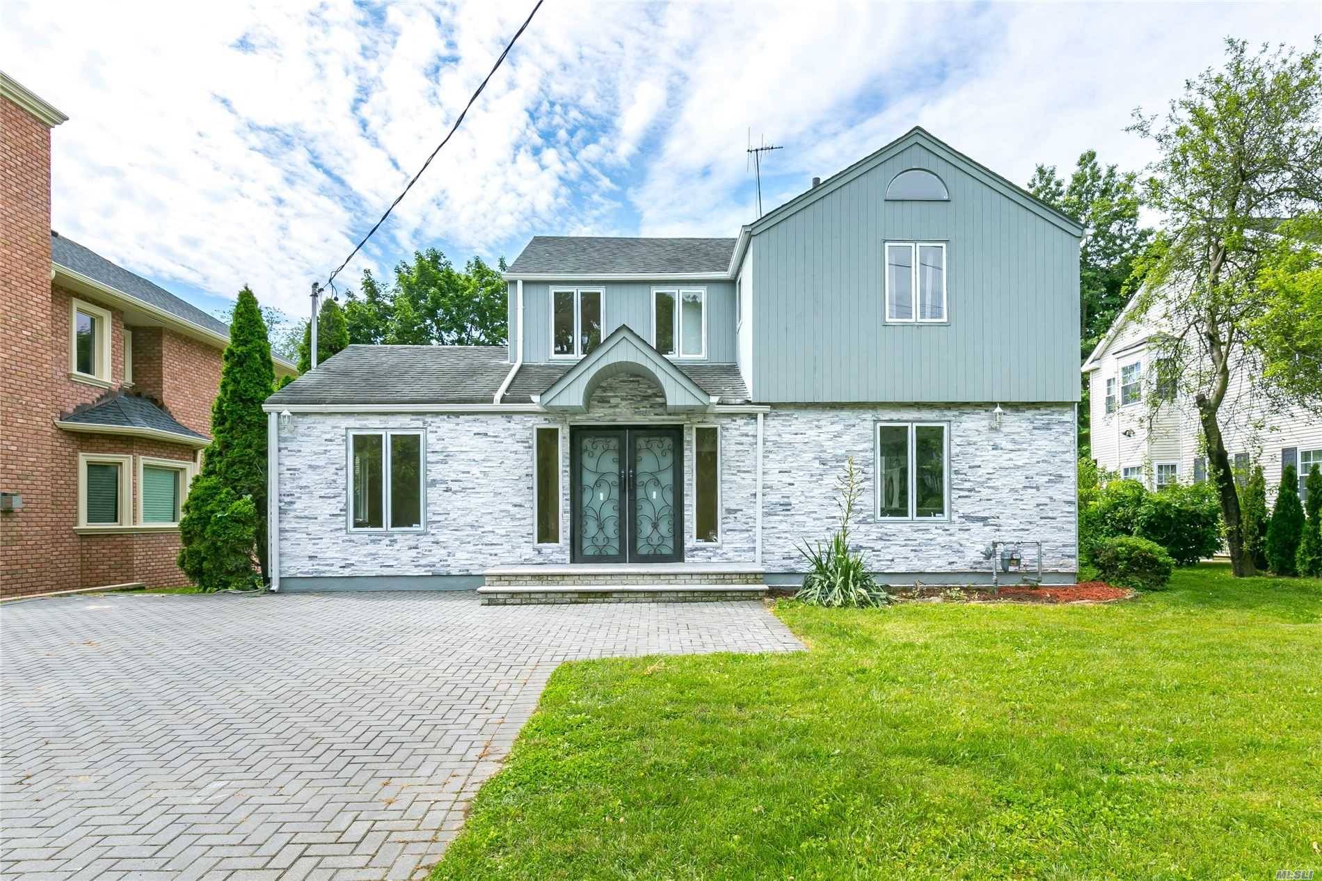 Move Right Into This Immaculate Fully Renovated Modern Colonial in The Desirable Great Neck School District.