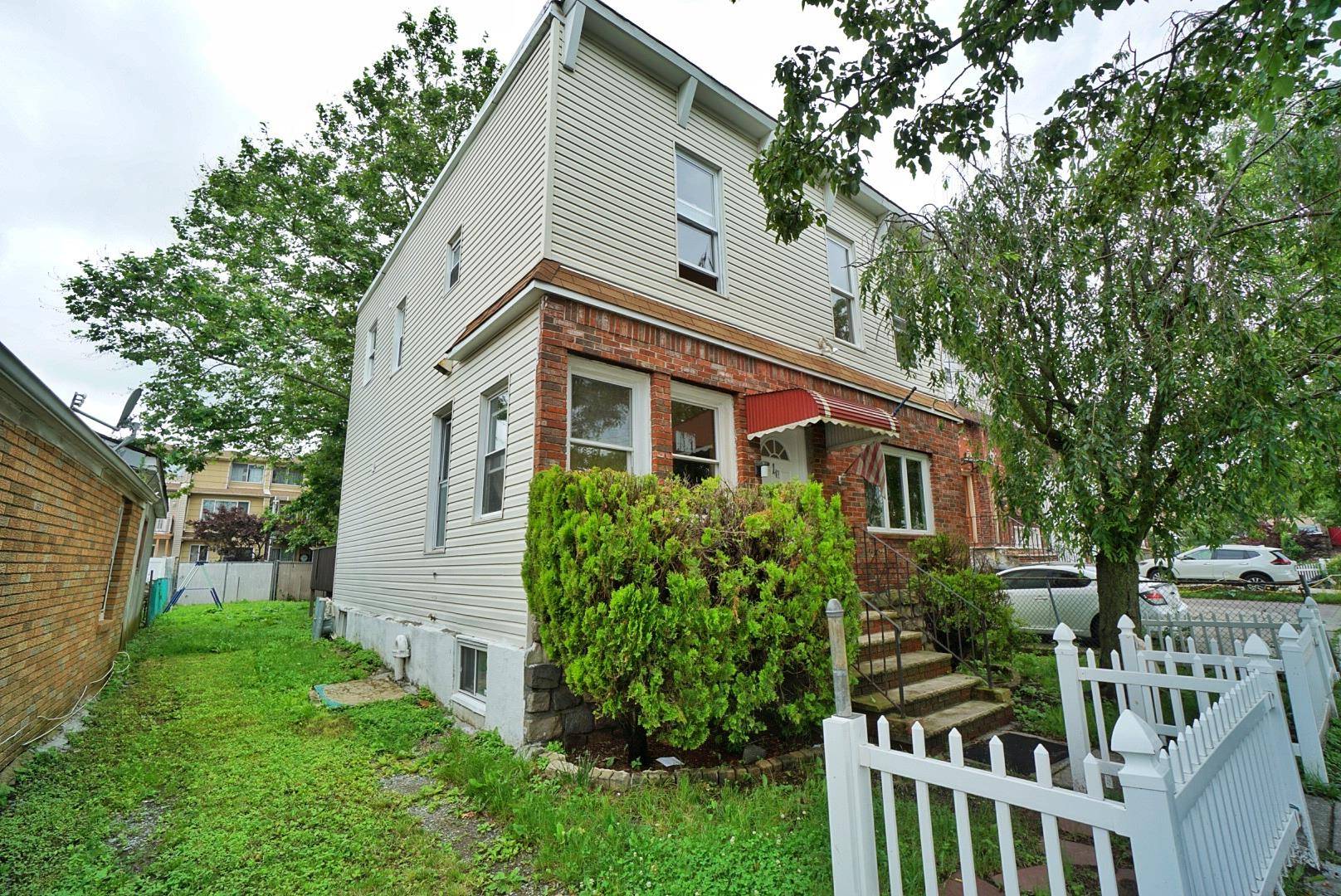 Introducing this beautiful two family house located in the heart of New Dorp Beach.