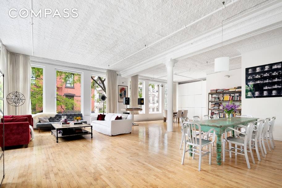 This extraordinarily unique corner loft is nestled in the heart of prime SoHo.