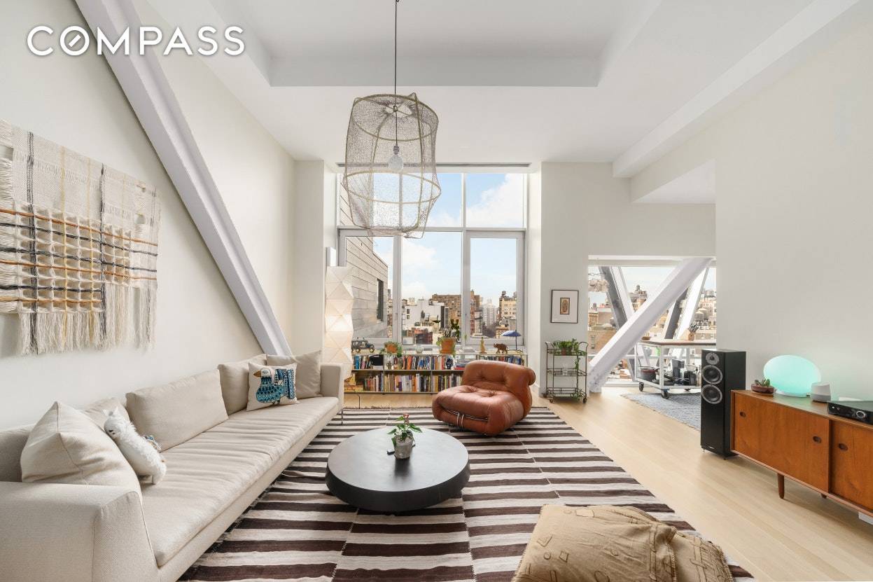 Dramatic and chic full floor condominium is now available on the red hot Bowery.
