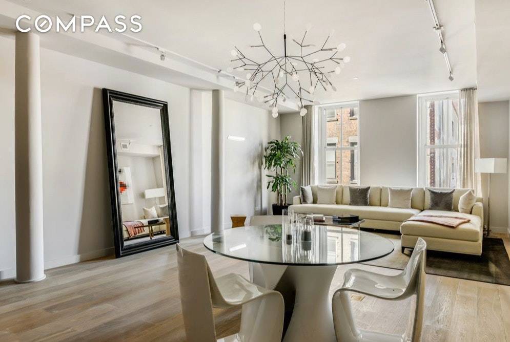 A gorgeous 2 bedroom, 2. 5 bath newly renovated loft in the most premium location on Greene Street within Soho.