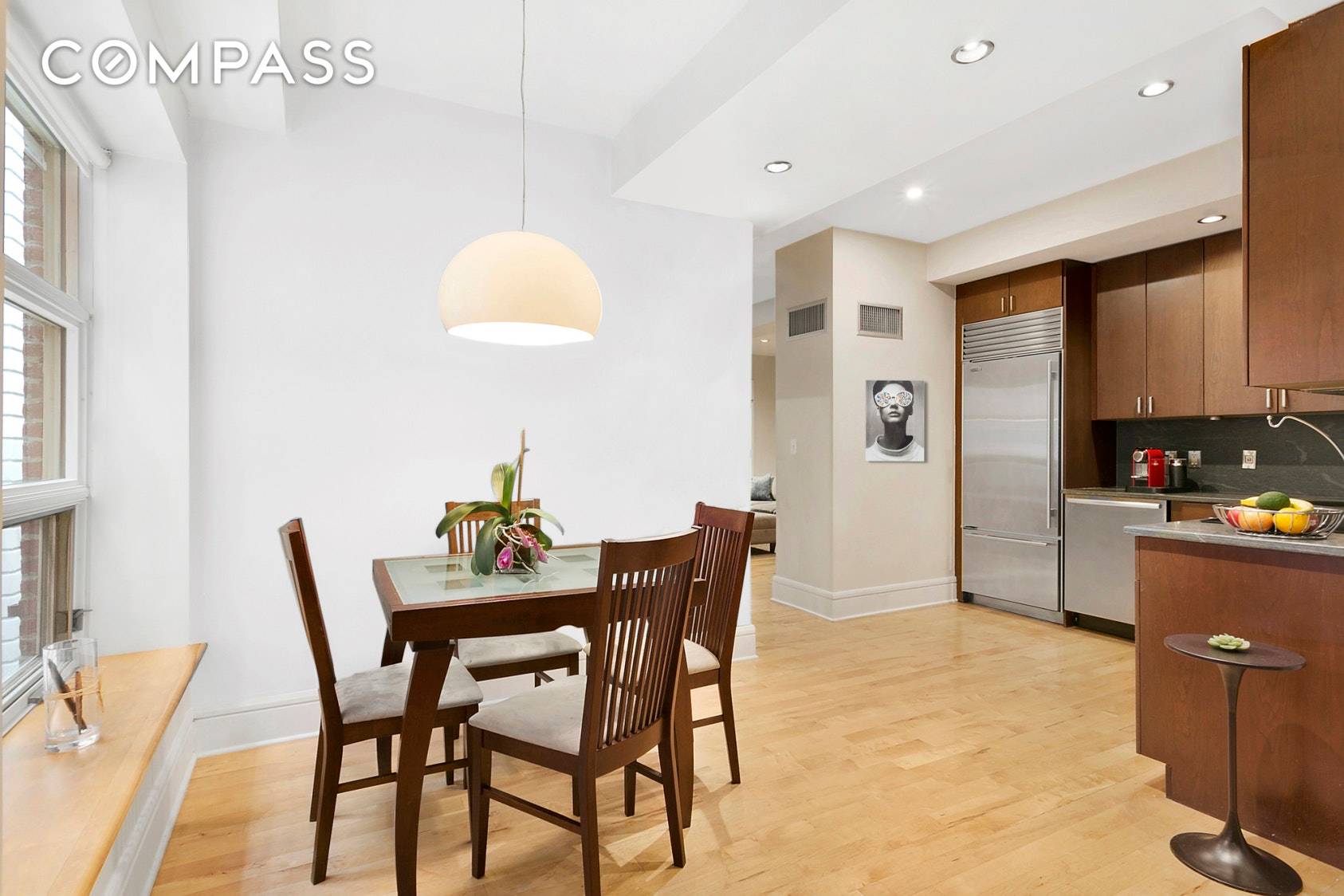 This large, loft style, converted two bedroom, one bath apartment has a rambling floor plan that lends itself to many options, with the feeling of a true home.