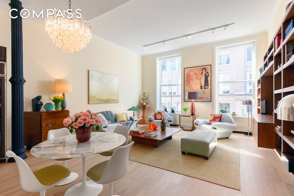 In pristine condition, this two bedroom historical condo residence features soaring south facing windows, original cast iron columns and incredible volume throughout.