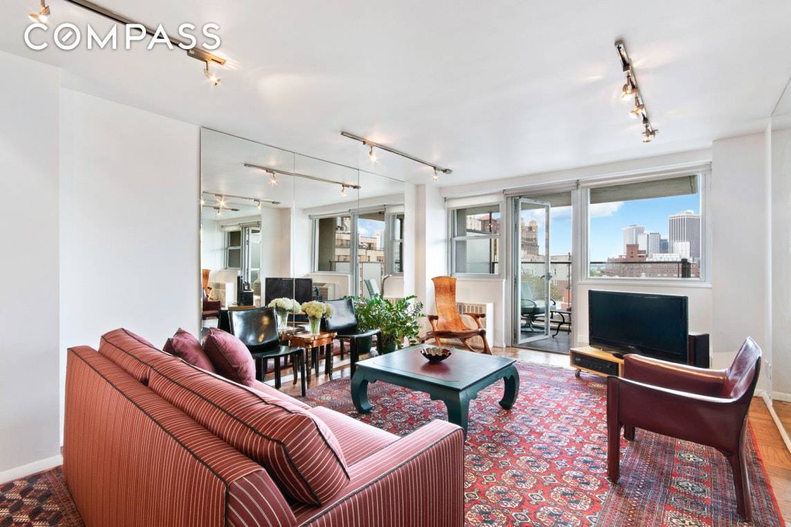 This spacious one bedroom apartment features a large balcony with views of downtown Manhattan and the tree lined landmarked blocks of Brooklyn Heights.