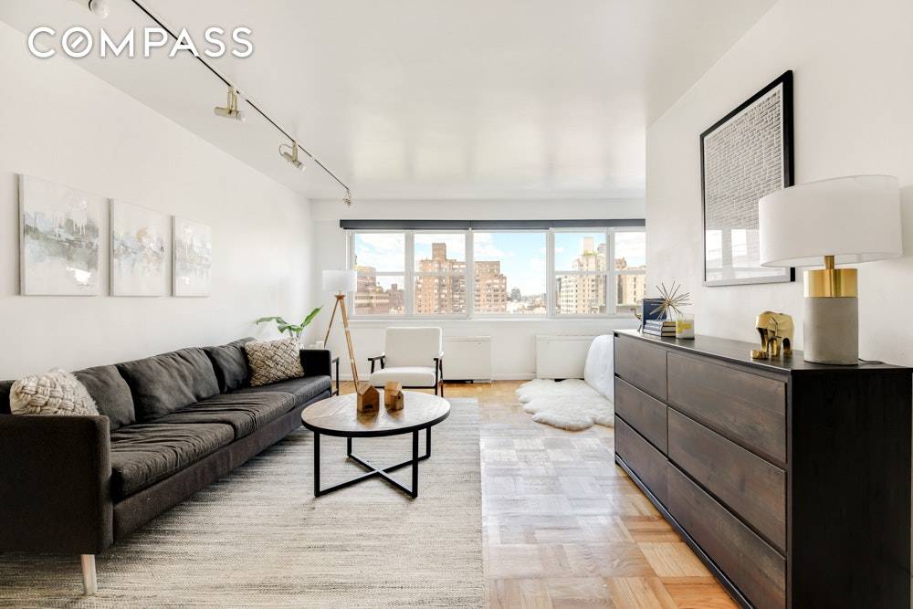 Sunny, Spacious, and West facing Convertible 1 Bedroom in Prime Greenwich Village !