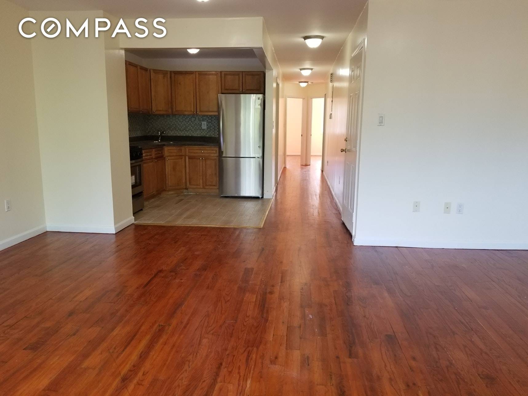 Spacious floor through 3 bedrooms with 2 full bathrooms apartment located at the top floor of a small town house.