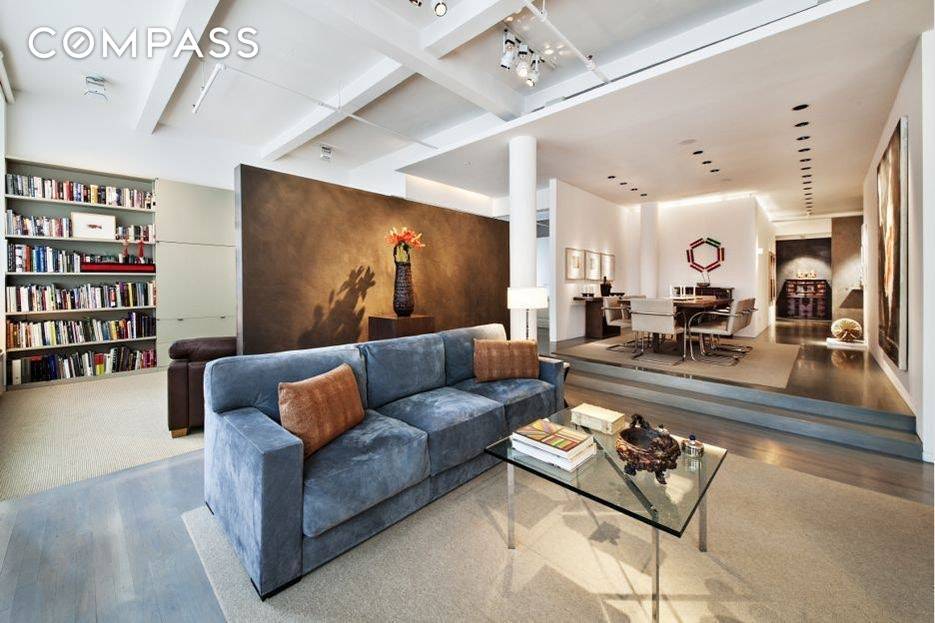 Architecture and design create a perfect space for entertaining in this New York Flatiron Loft apartment.