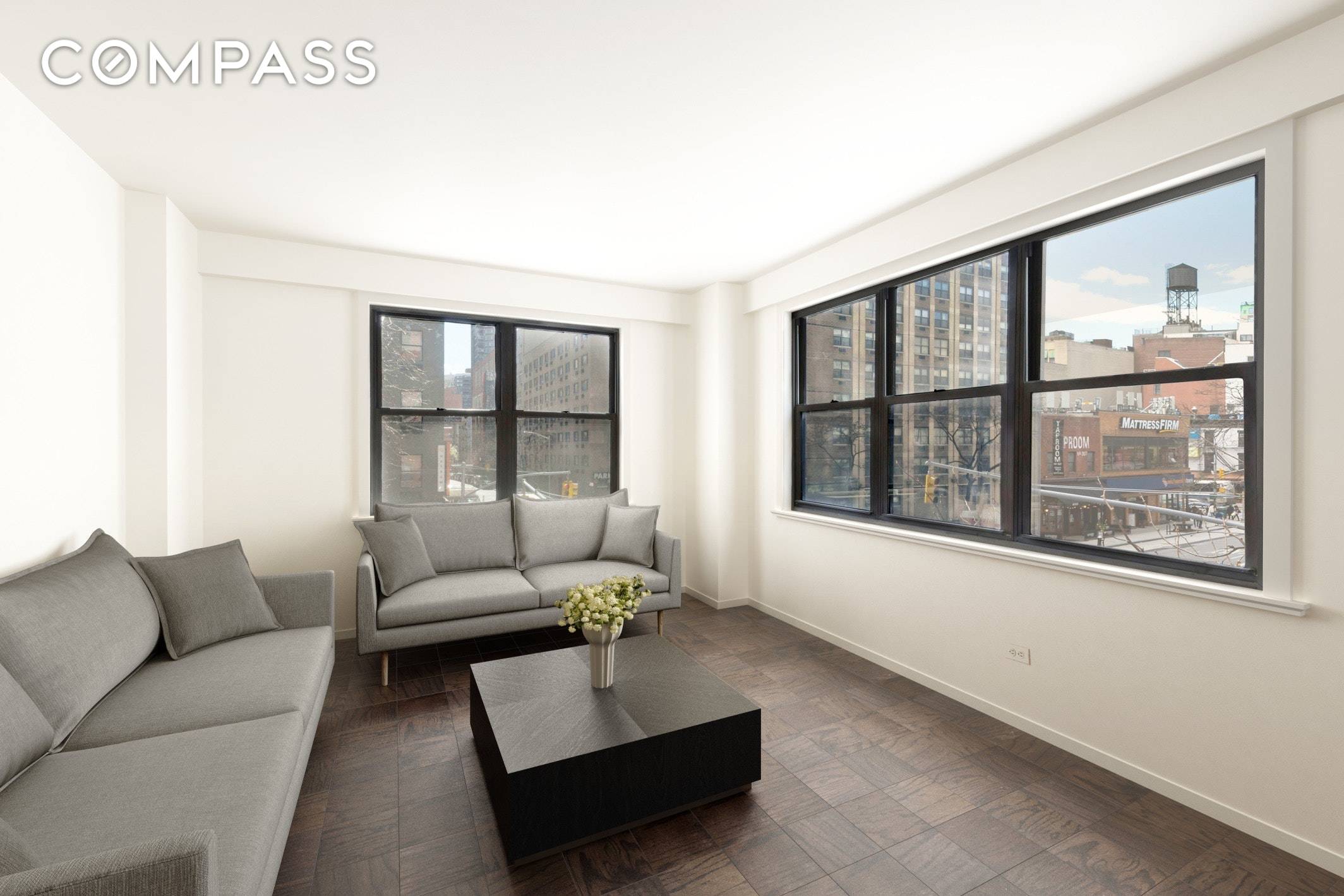This rarely available corner apartment awaits your personal touch.