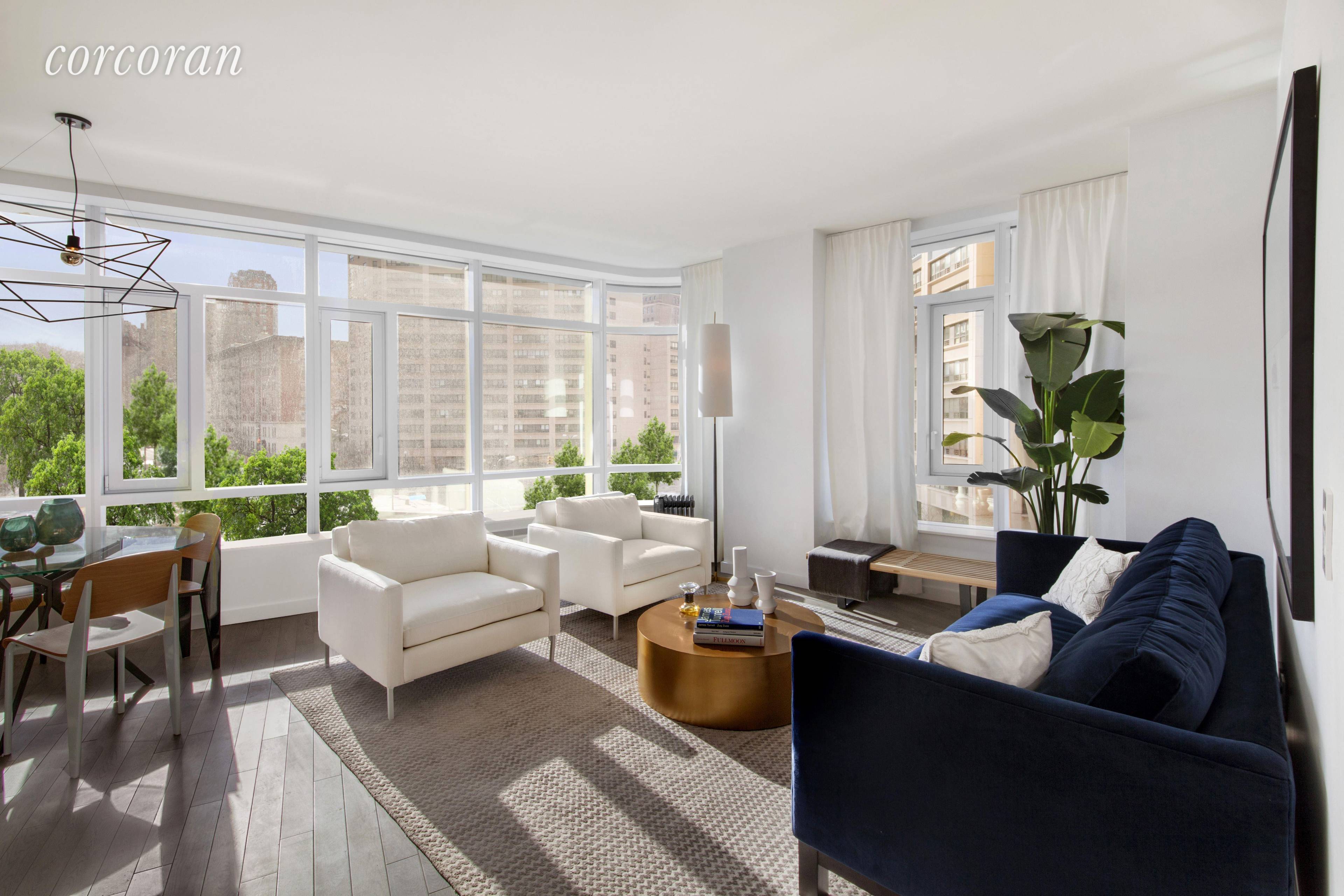 This spaciously laid out corner three bedroom, three bathroom residence boasts 1, 596 square feet of space with views of Frederick Douglass Circle and Central Park.